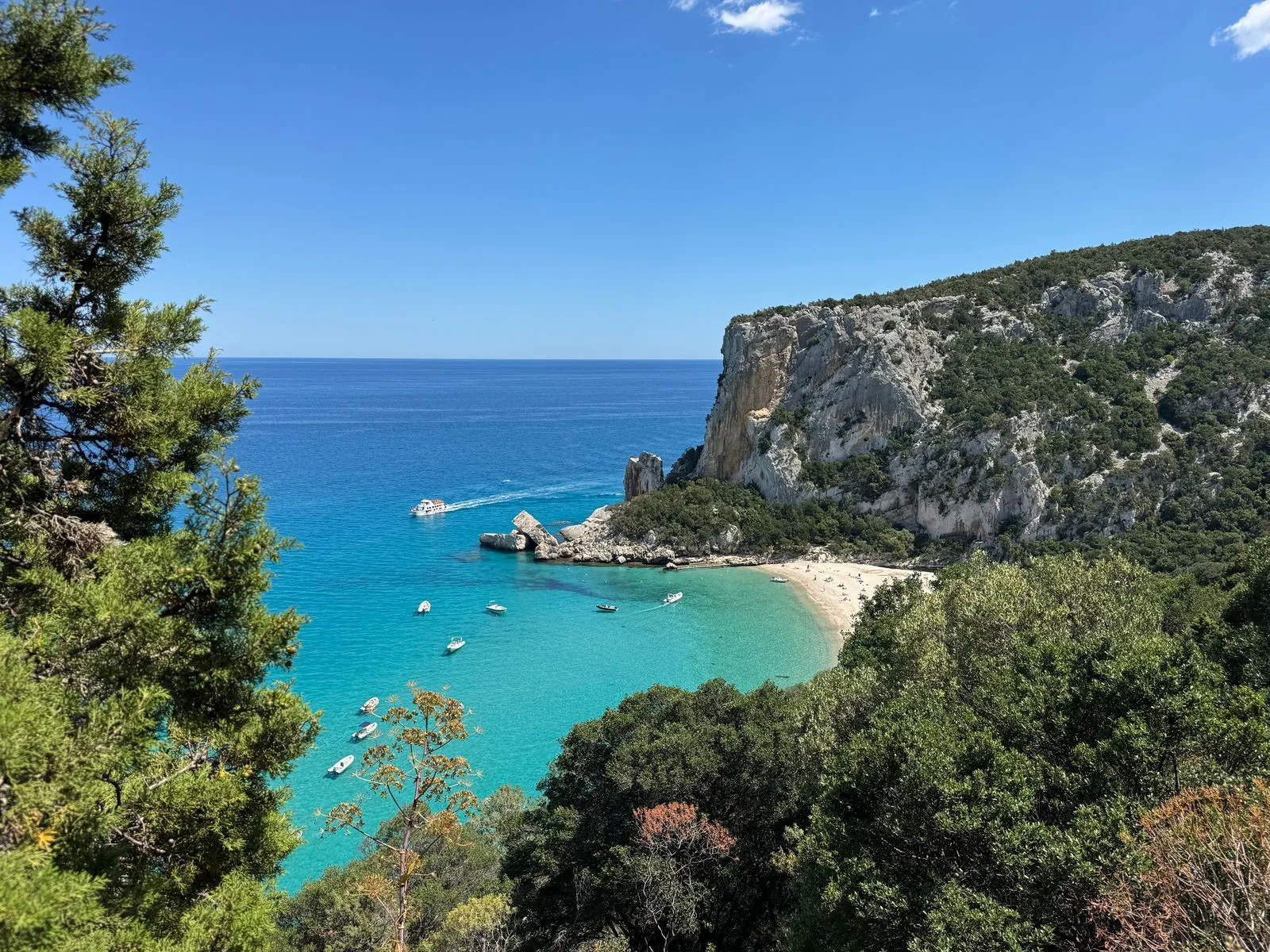 Cala Luna, a beach backed by limestone cliffs in the Gulf of Orosei